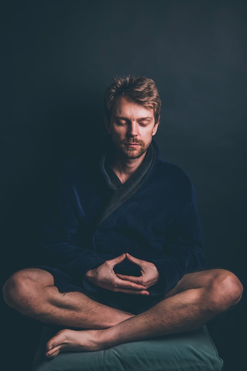 Man practicing deep belly breathing